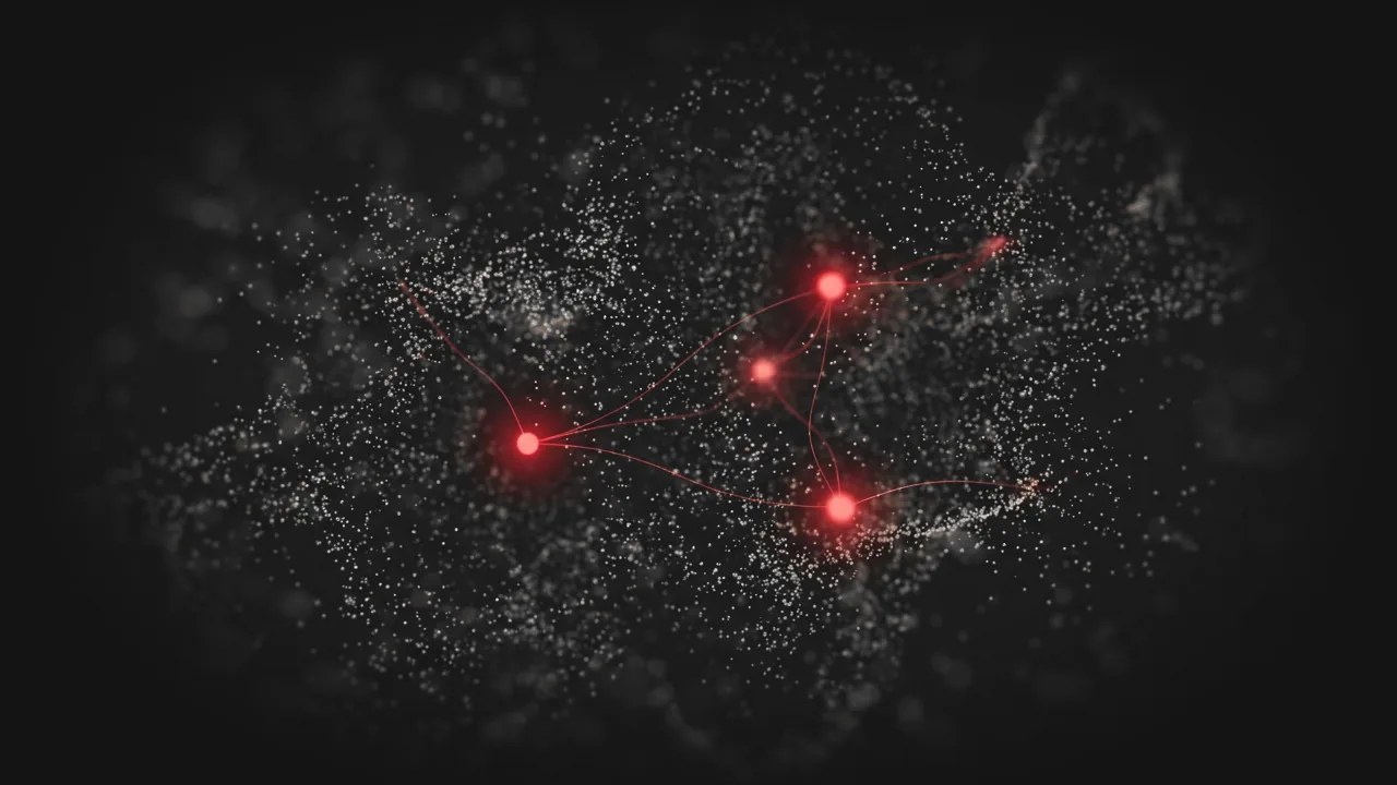 A cloud of gray particles with a few glowing red points linked by thin lines